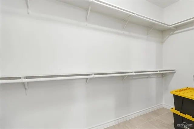 a view of a room with shelf on the wall