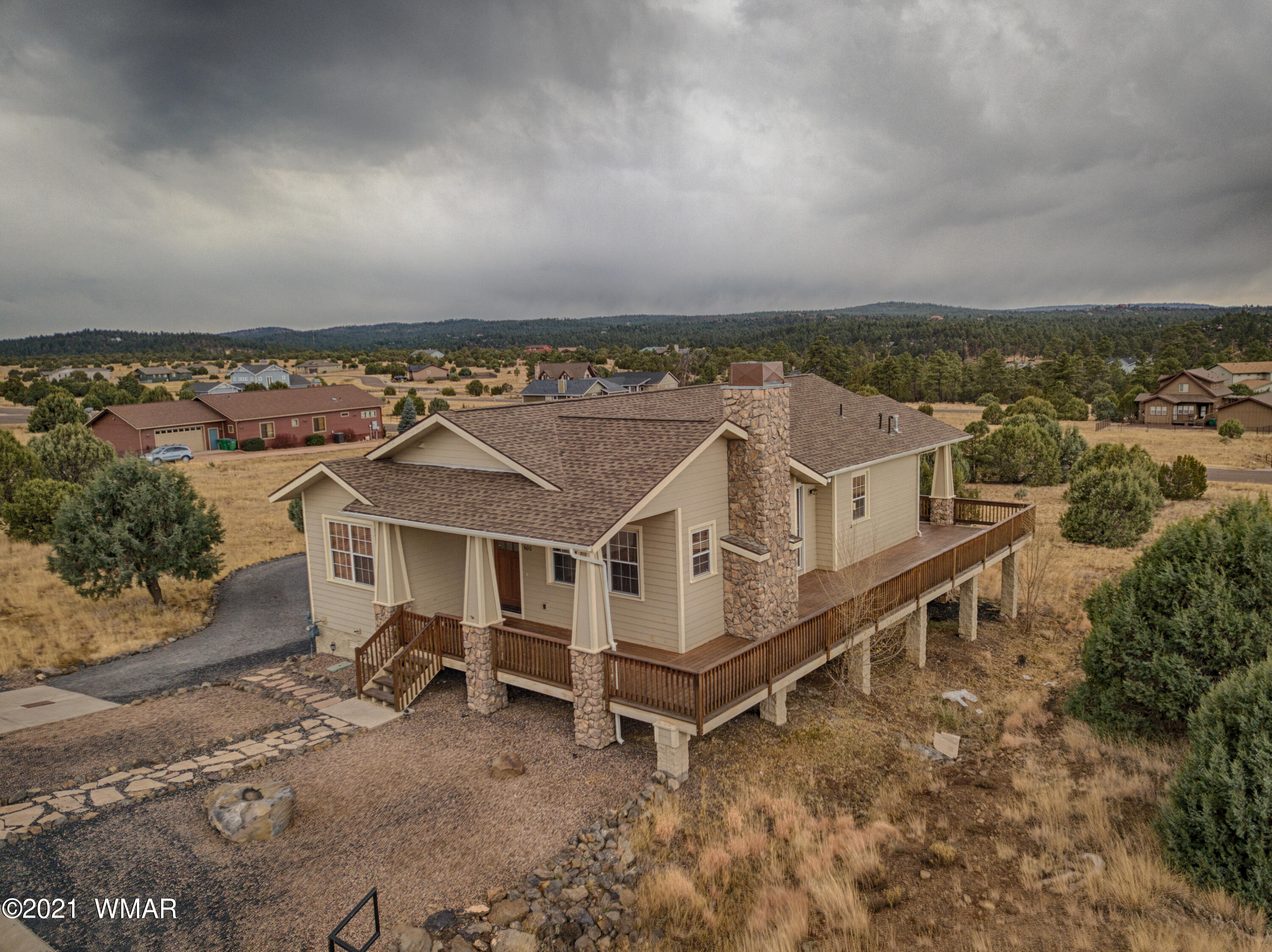 600 South Rock Ridge Drive Show Low, AZ 85901 - Photo 1 of 25 an aerial view of a house with a yard