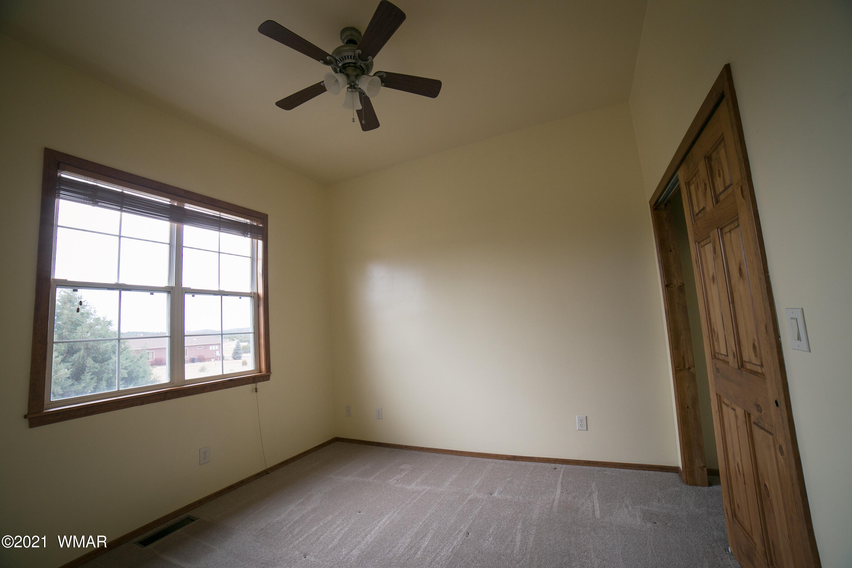 600 South Rock Ridge Drive Show Low, AZ 85901 - Photo 16 of 25 an empty room with windows