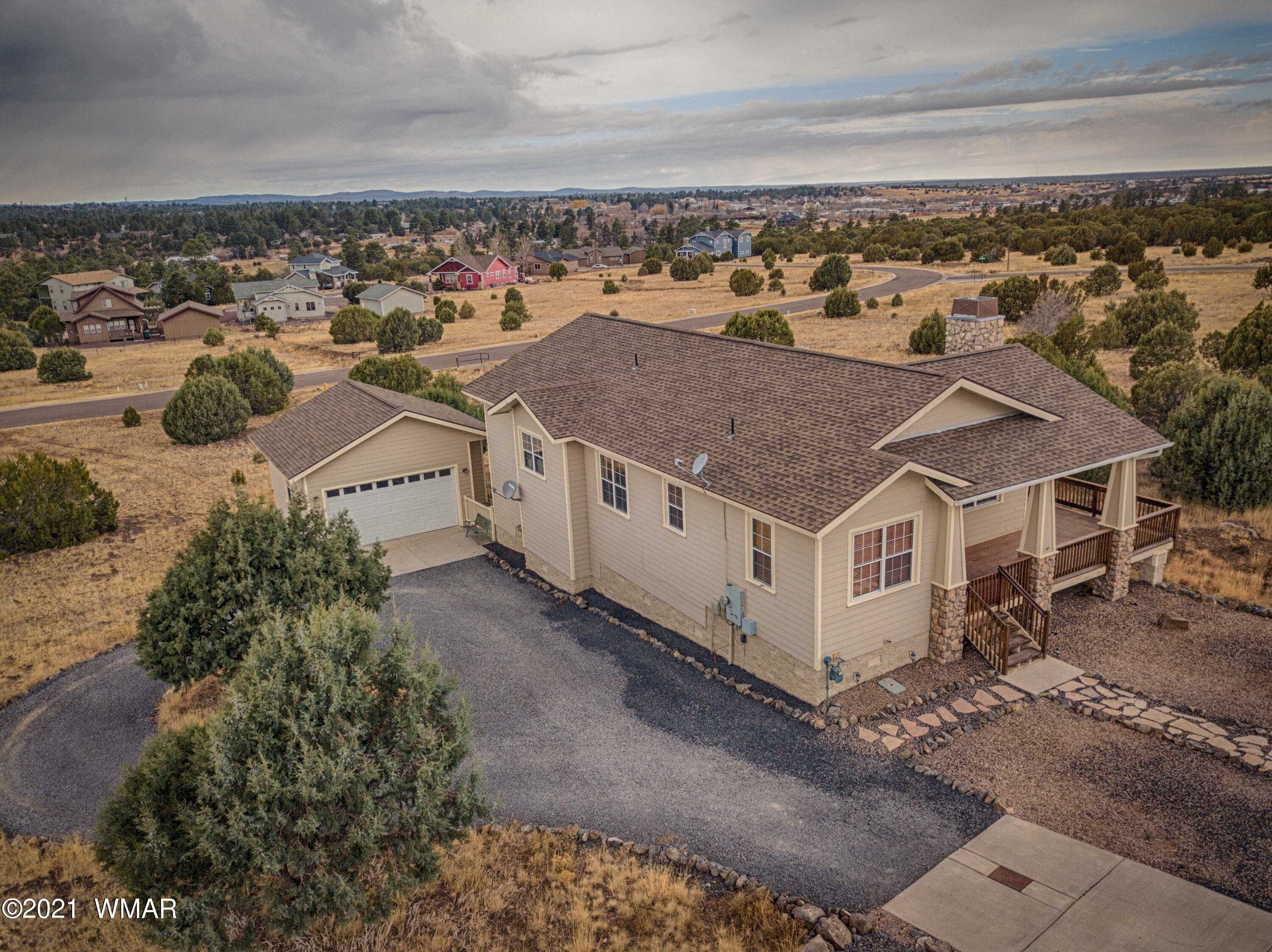 600 South Rock Ridge Drive Show Low, AZ 85901 - Photo 2 of 25 an aerial view of a house