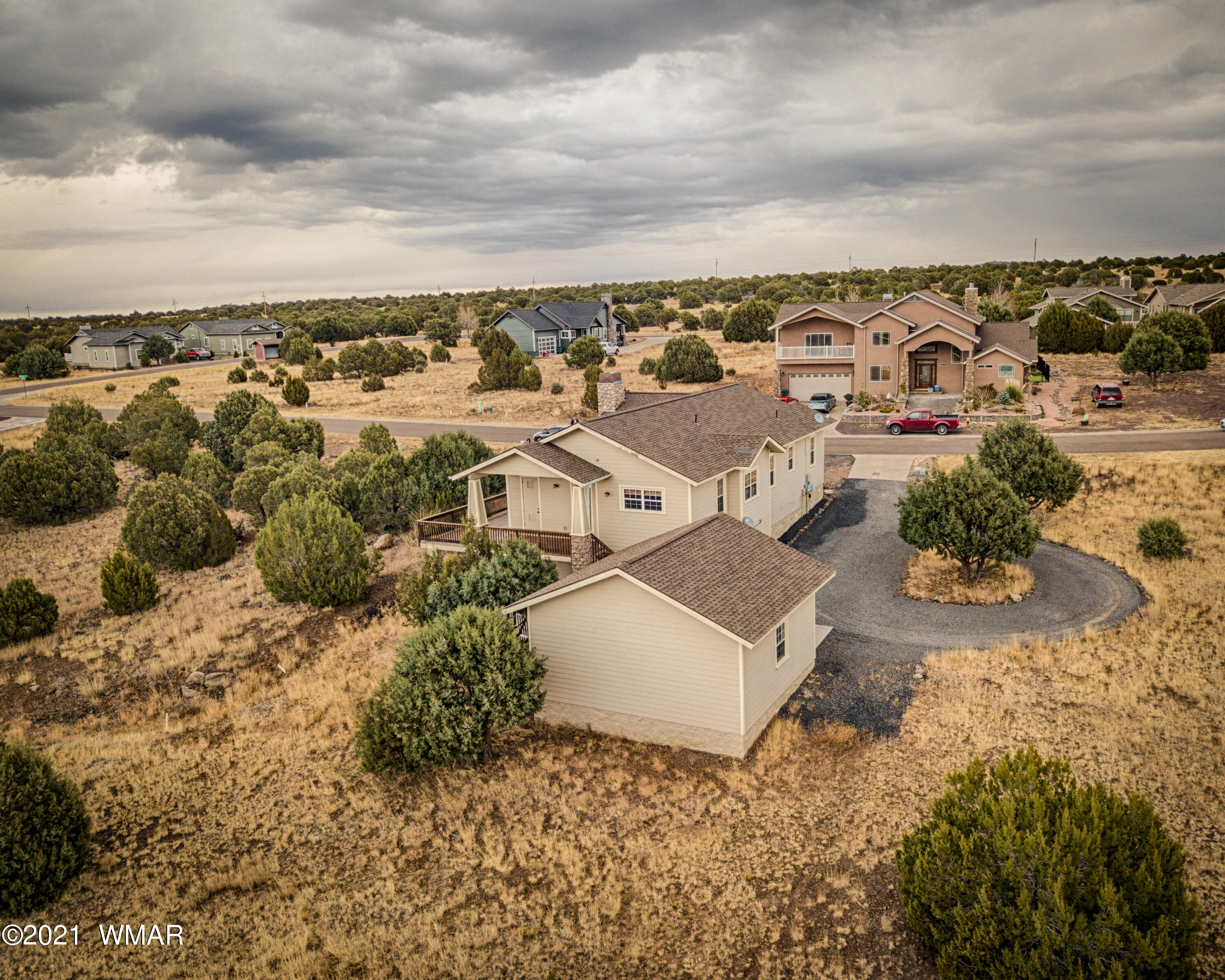 600 South Rock Ridge Drive Show Low, AZ 85901 - Photo 4 of 25 an aerial view of residential houses with outdoor space