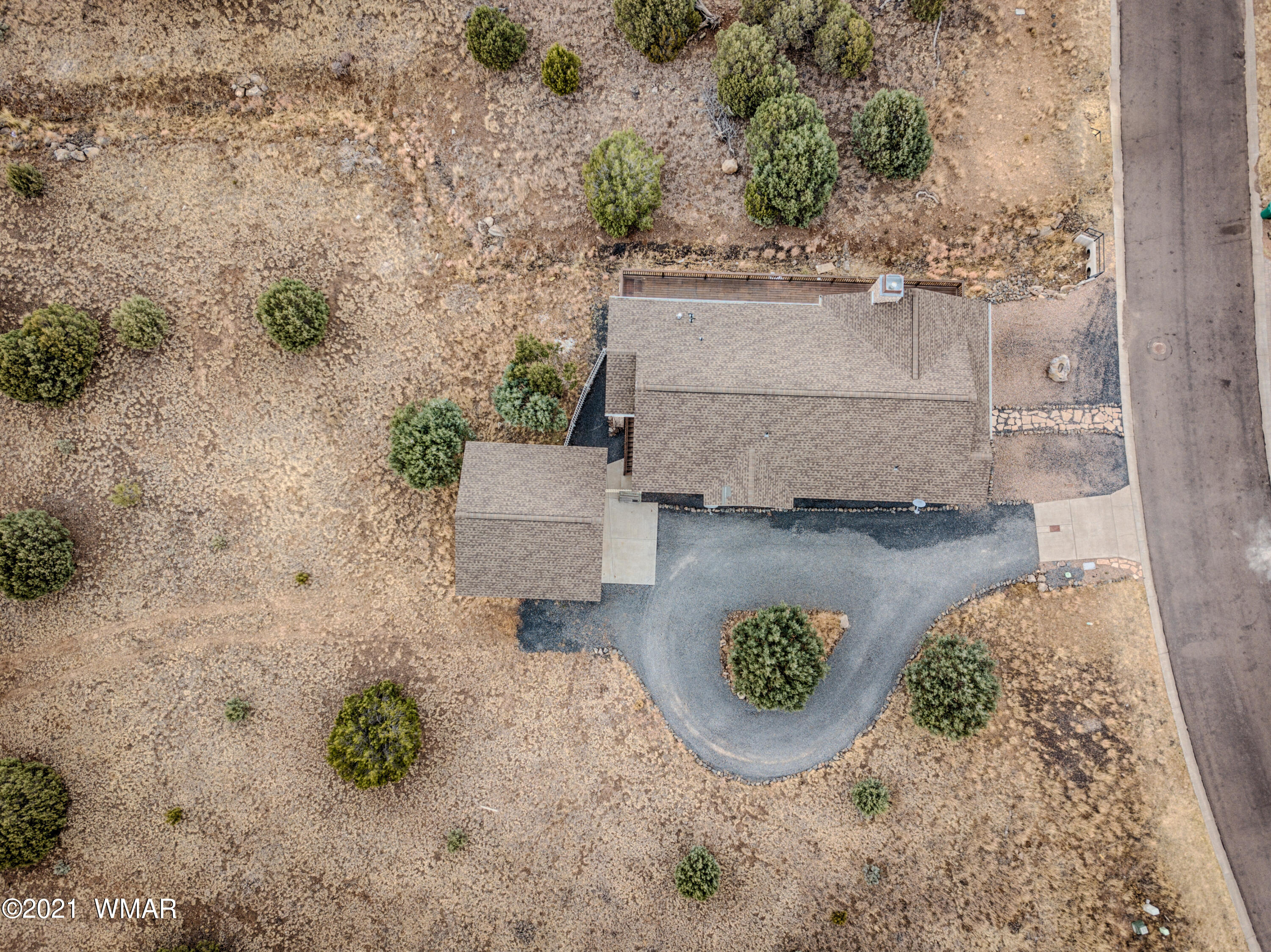 600 South Rock Ridge Drive Show Low, AZ 85901 - Photo 6 of 25 an aerial view of a red top and tree