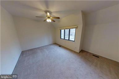 1543 Scandia Circle Reston, VA 20190 - Photo 13 of 30 an empty room with windows and fan