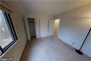 1543 Scandia Circle Reston, VA 20190 - Photo 17 of 30 a view of a livingroom with an empty space and a window