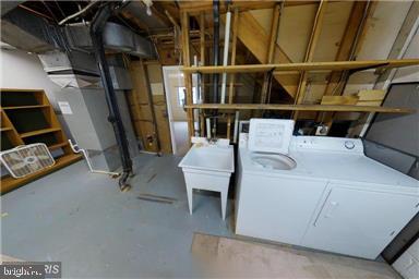 1543 Scandia Circle Reston, VA 20190 - Photo 26 of 30 a utility room with dryer and washer