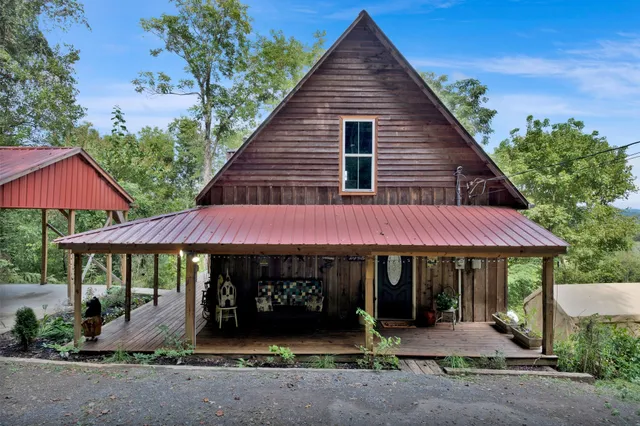 a front view of a house with porch