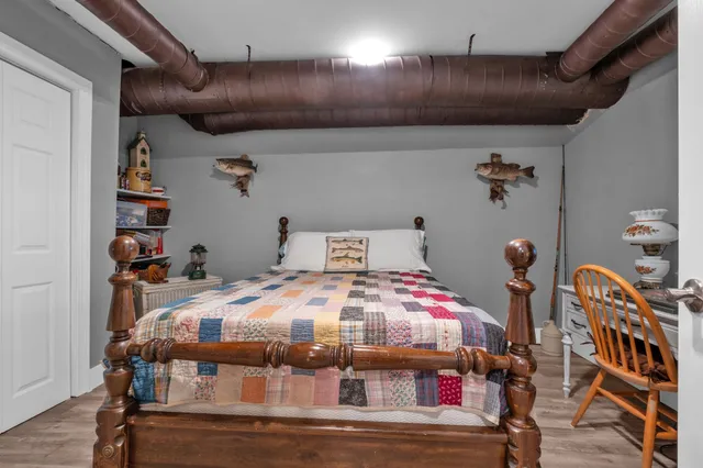 a bedroom with two beds and painted walls