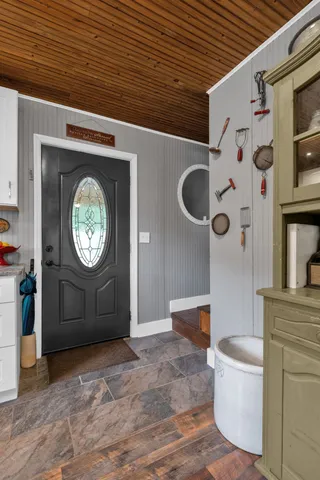 a view of a hallway with washer and dryer