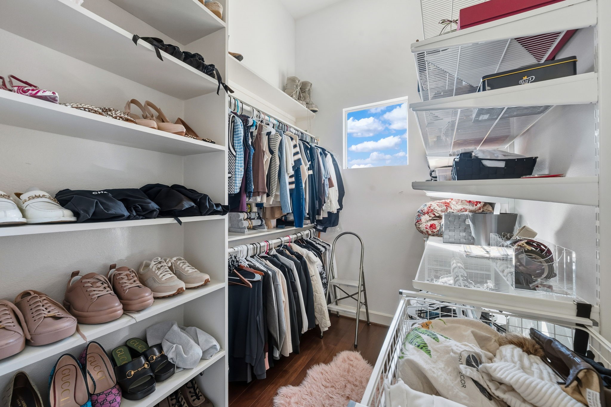 3302 Lake Street, Unit 3 Houston, TX 77098 - Photo 12 of 20 a view of walk in closet with clothes and shoes