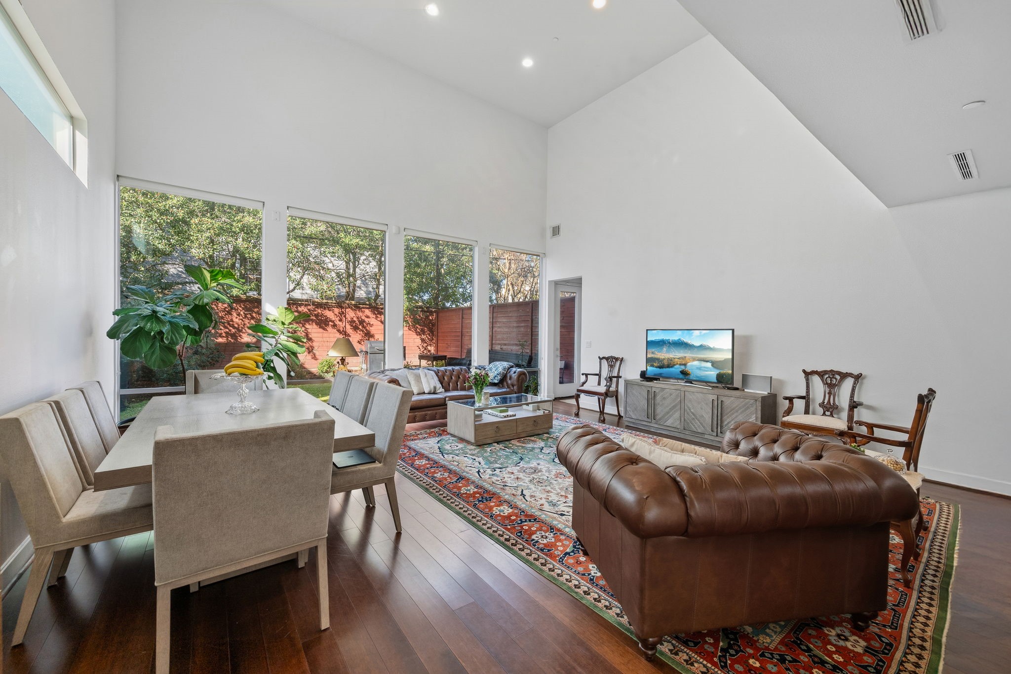 3302 Lake Street, Unit 3 Houston, TX 77098 - Photo 4 of 20 a living room with furniture and a large window