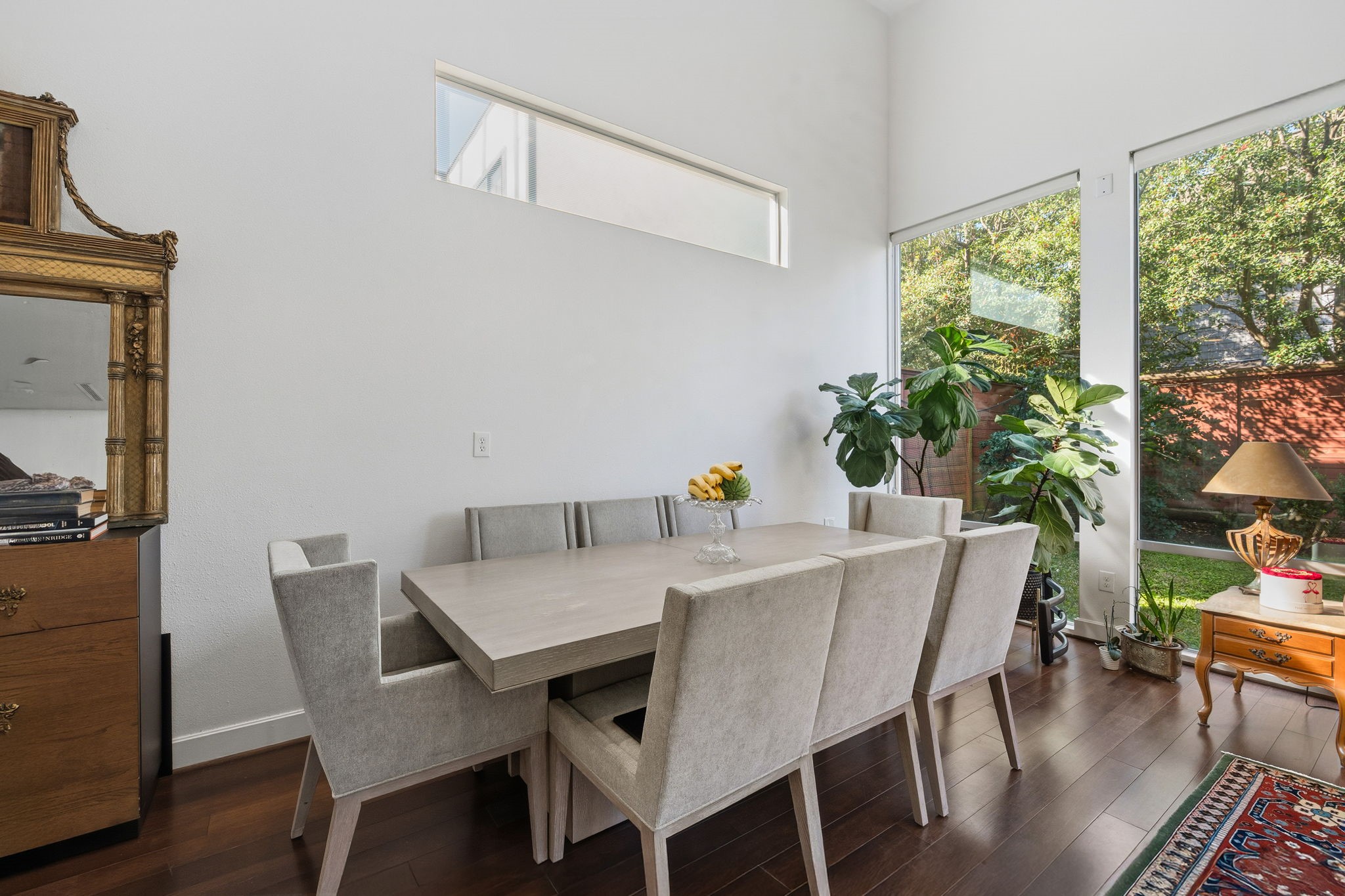3302 Lake Street, Unit 3 Houston, TX 77098 - Photo 5 of 20 a view of a dining room with furniture window and wooden floor