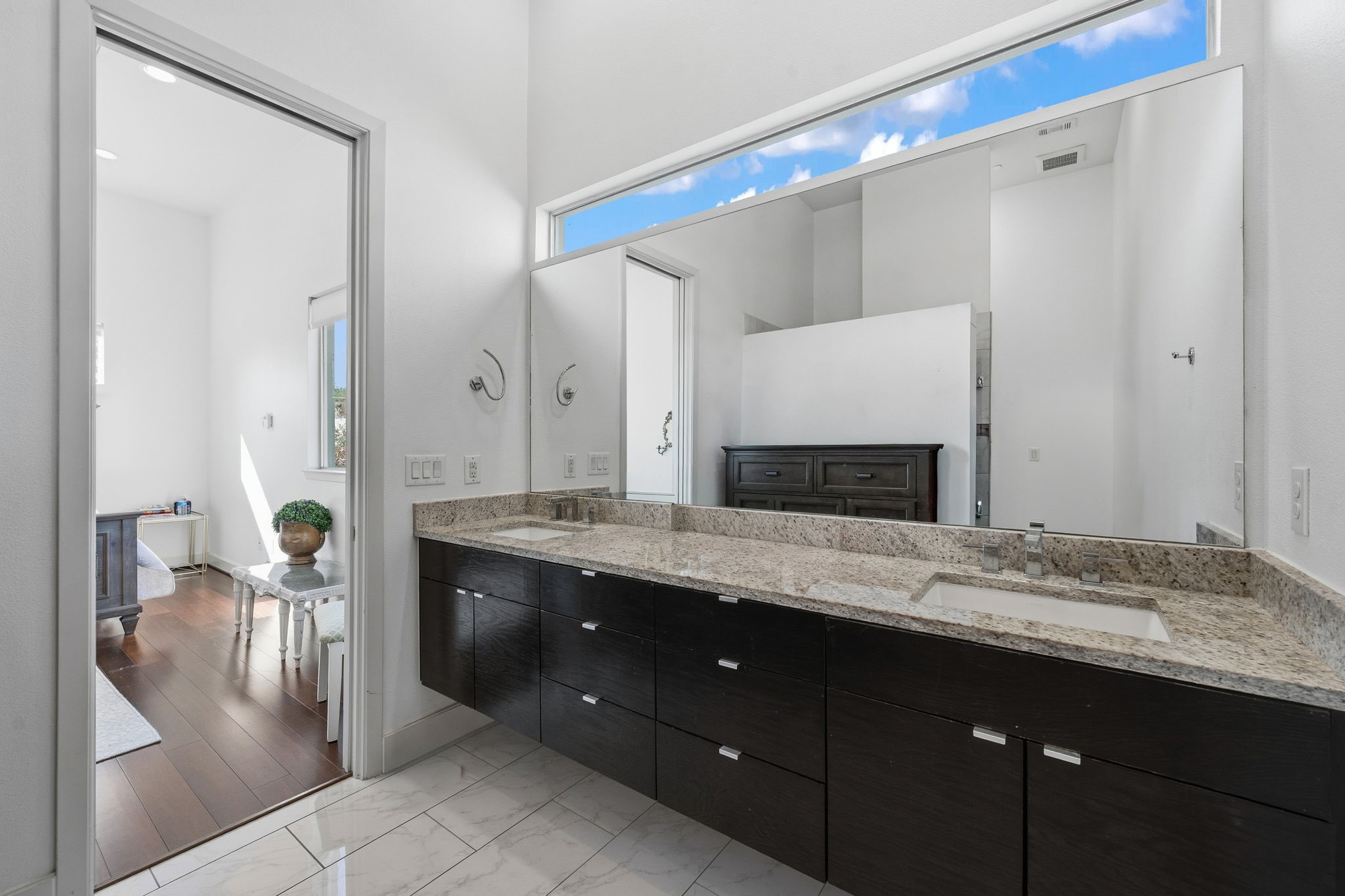 3302 Lake Street, Unit 3 Houston, TX 77098 - Photo 10 of 20 a bathroom with a granite countertop sink mirror and double
