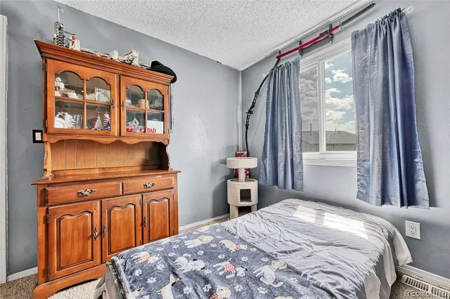 a view of a chairs and table in the patio