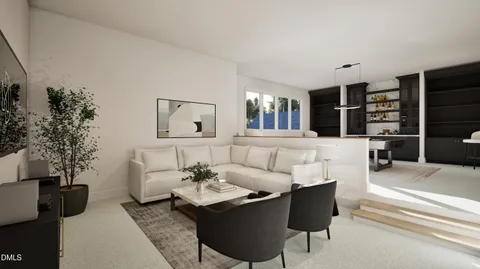 a living room with furniture a rug and a window