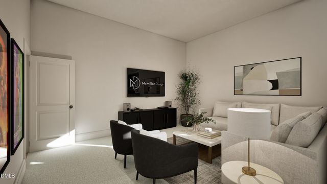 a living room with furniture a rug and a flat screen tv