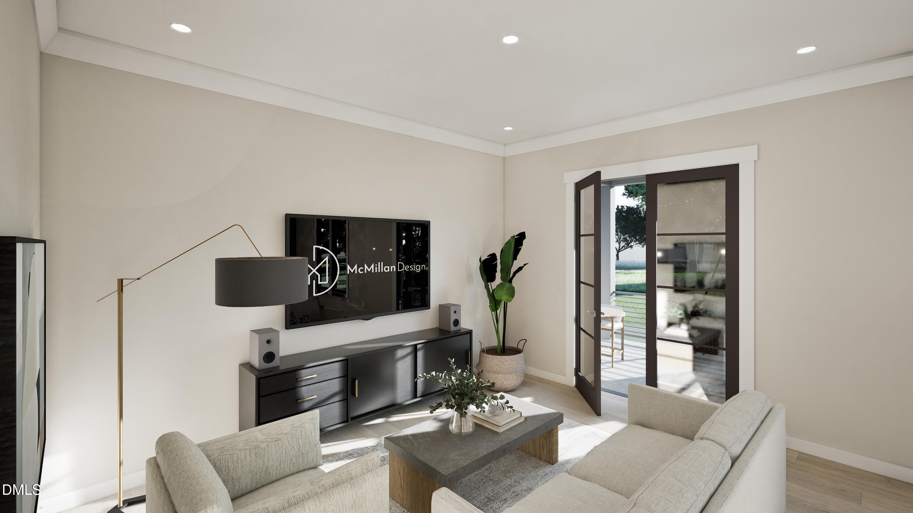 3028 Mt Vernon Church Road Raleigh, NC 27613 - Photo 38 of 48 a living room with furniture and a flat screen tv