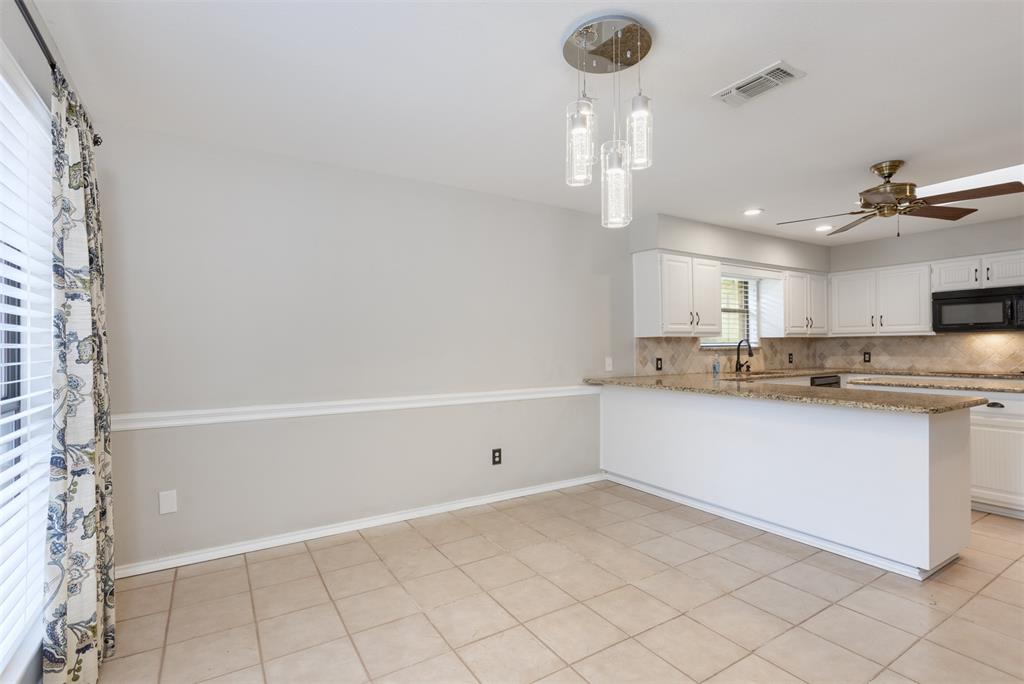 68 Legend Road Benbrook, TX 76132 - Photo 11 of 34 View of the breakfast room facing the kitchen.