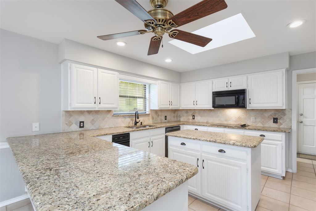 68 Legend Road Benbrook, TX 76132 - Photo 12 of 34 Lots of granite countertops for easy entertaining! You could have a smorgasbord on this buffet!