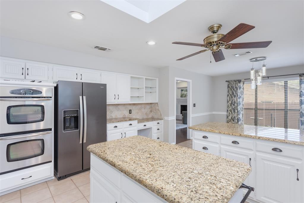 68 Legend Road Benbrook, TX 76132 - Photo 15 of 34 Fridge remains with the home. Did you notice the double ovens?!