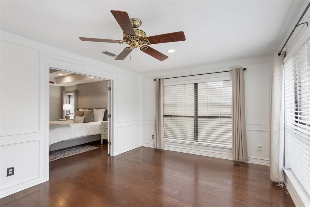 68 Legend Road Benbrook, TX 76132 - Photo 18 of 34 This secondary living space is a nice nook to sit and read or house a "conversation room" with swivel chairs right off of the bar!