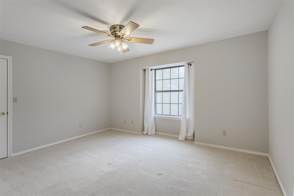 68 Legend Road Benbrook, TX 76132 - Photo 25 of 34 Upstairs bedroom overlooking the backyard.