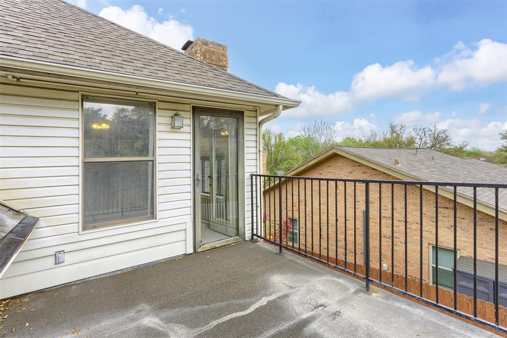 68 Legend Road Benbrook, TX 76132 - Photo 29 of 34 Balcony off of the upstairs bedroom.