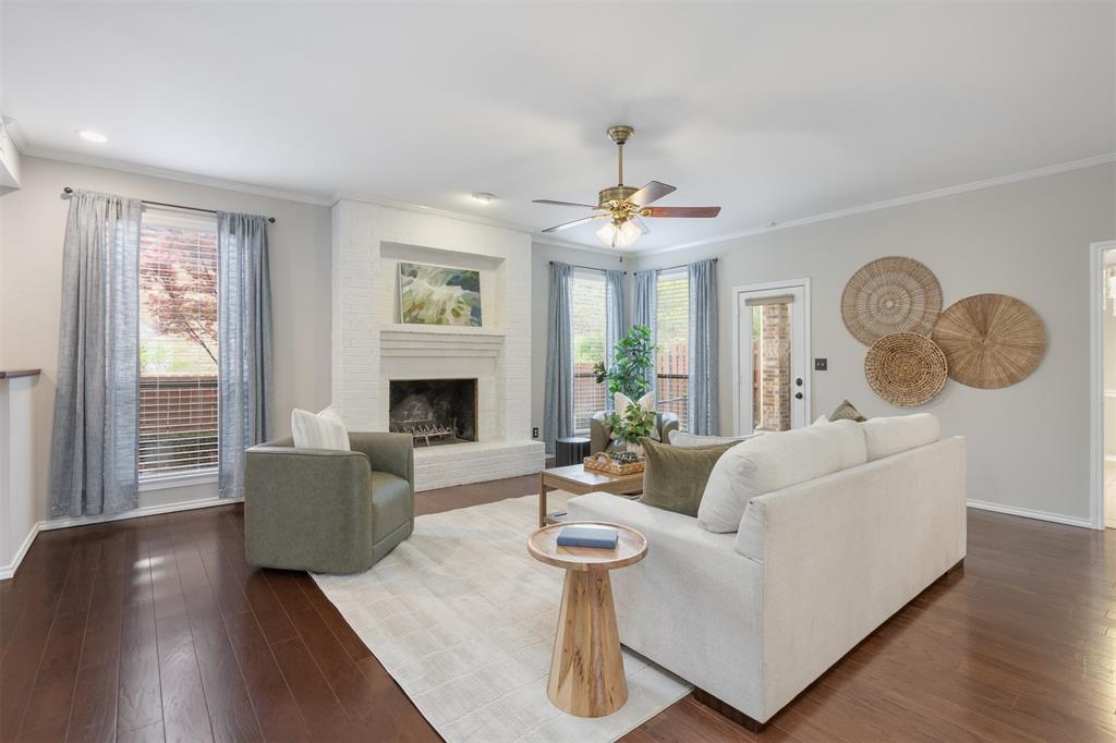 68 Legend Road Benbrook, TX 76132 - Photo 6 of 34 Family room with wood-burning fireplace leading to back covered patio!