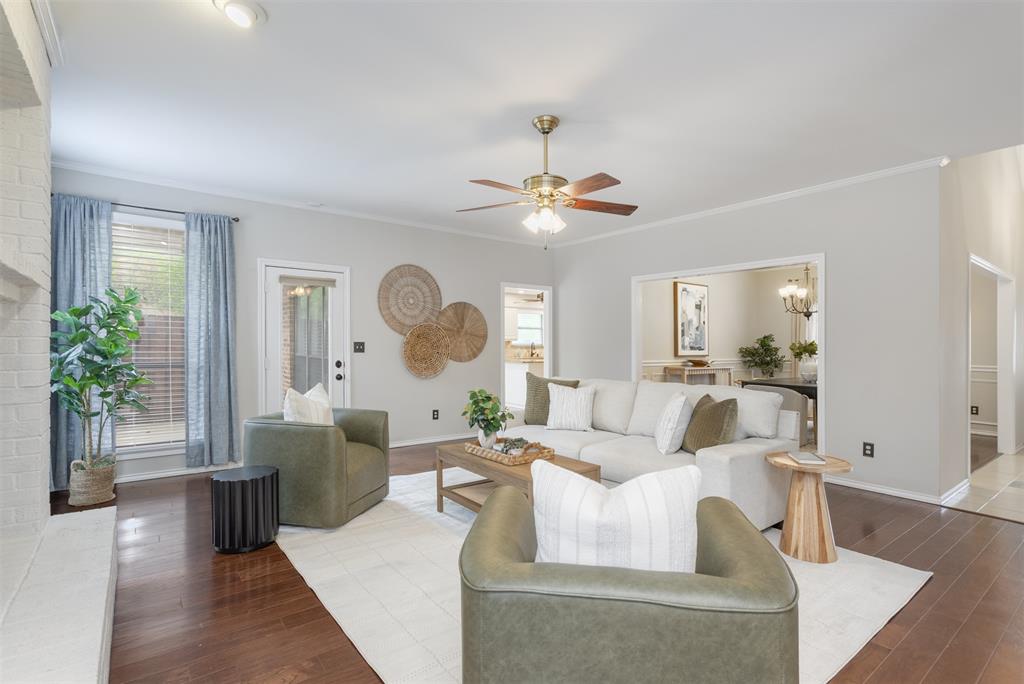 68 Legend Road Benbrook, TX 76132 - Photo 7 of 34 Family room open to the dining area just off the kitchen. Flooring is engineered hardwoods.