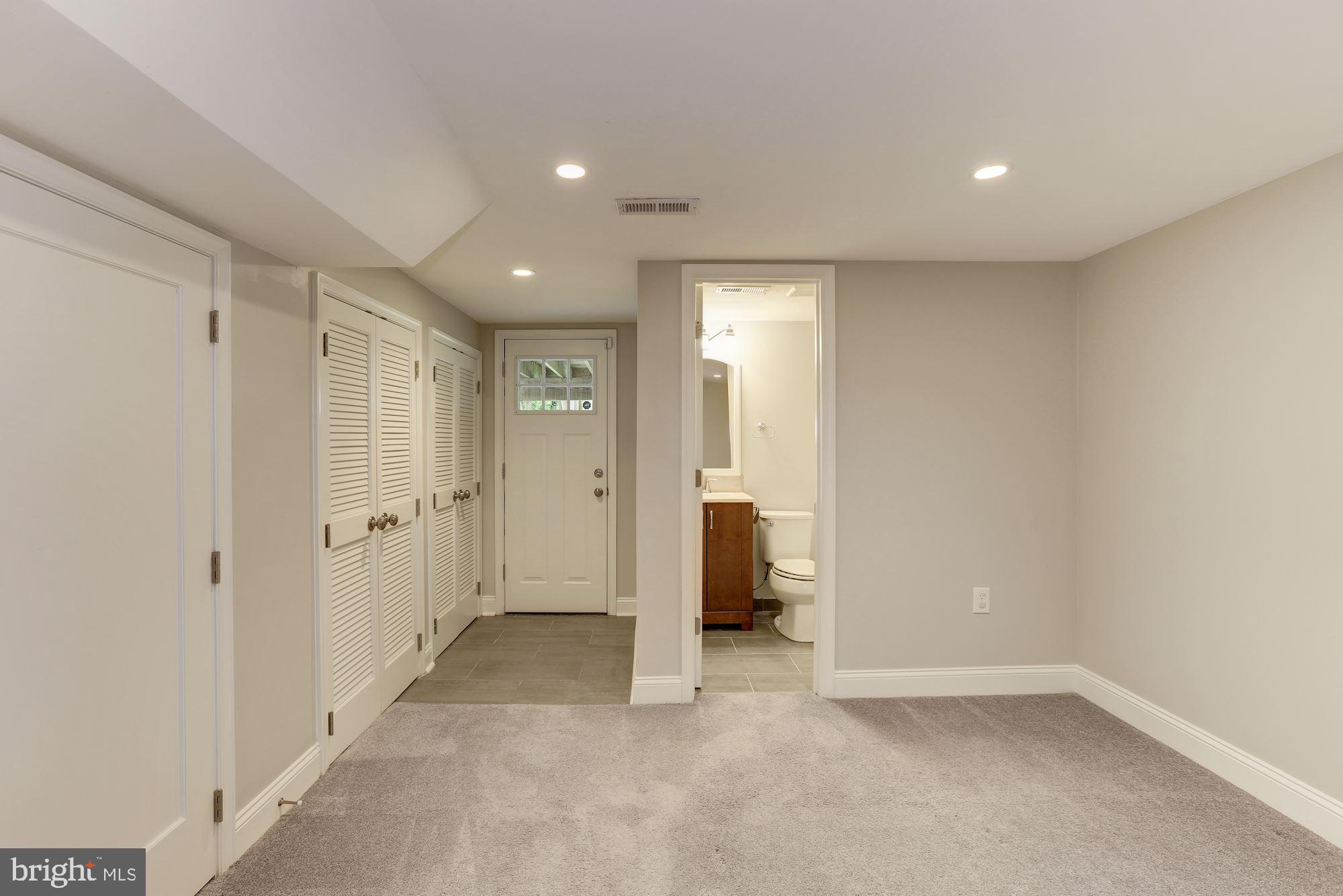 3480 23rd Street Southeast Washington, DC 20020 - Photo 23 of 32 Lower Level Bedroom w/ Full Bath and Rear Entry