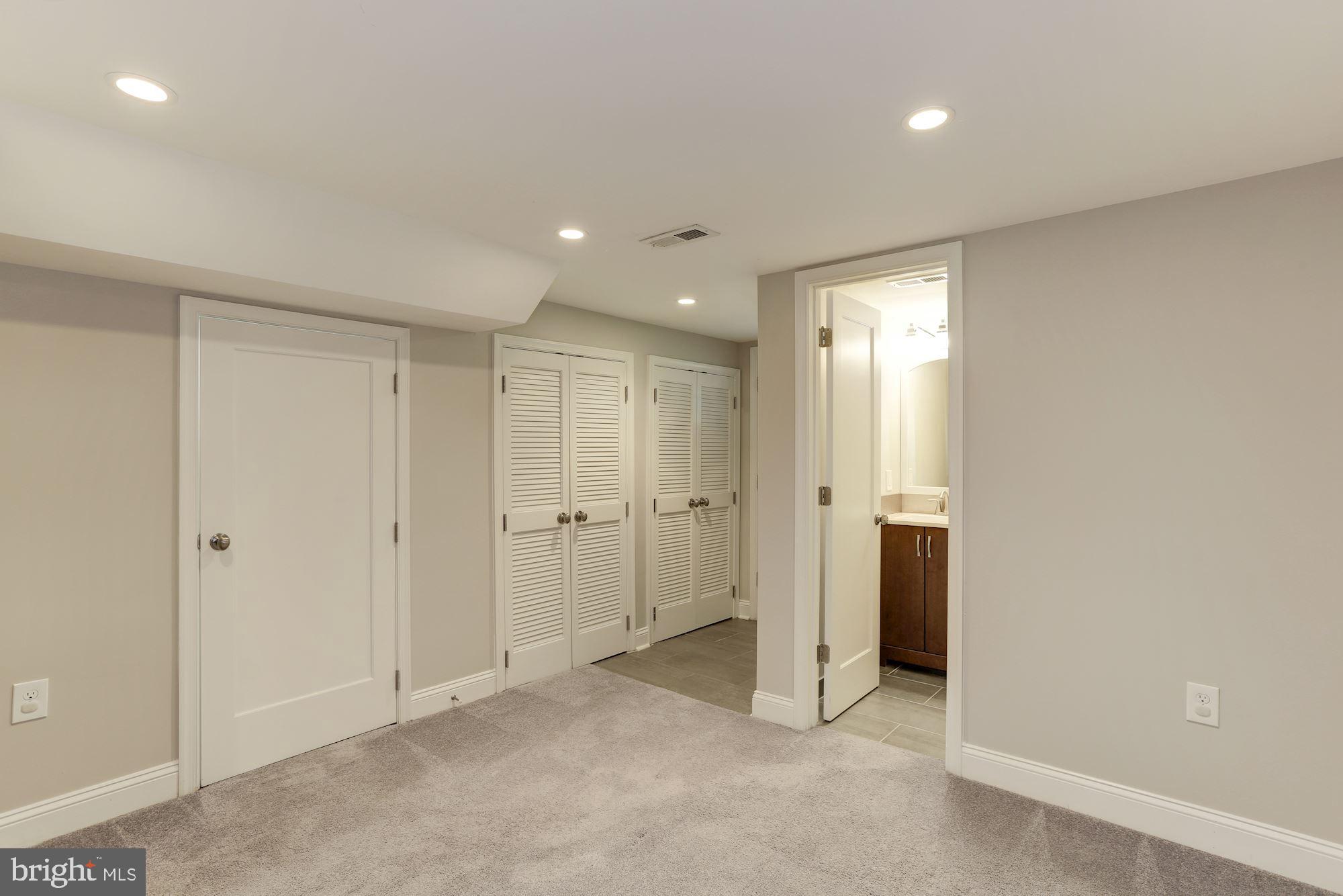 3480 23rd Street Southeast Washington, DC 20020 - Photo 25 of 32 Lower Level Bedroom w/ Full Bath and Rear Entry
