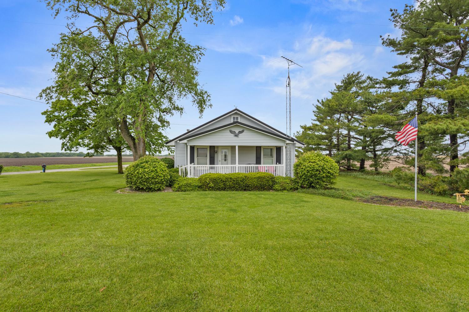 4520 North 600 East Road Sidell, IL 61876 - Photo 1 of 31 a front view of a house with garden