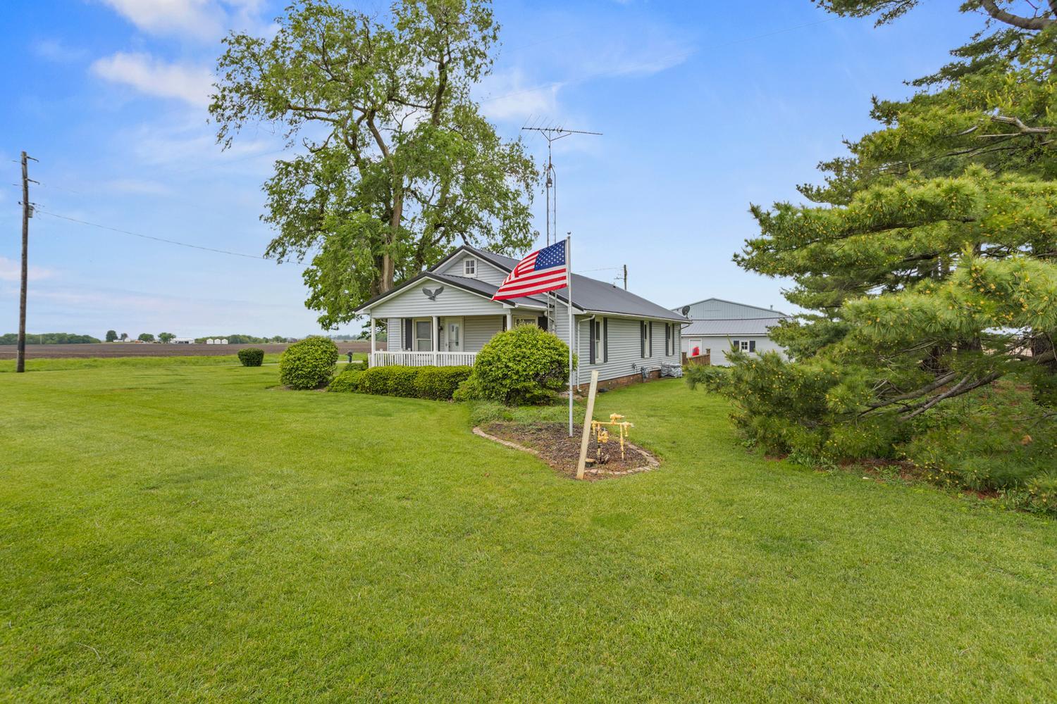 4520 North 600 East Road Sidell, IL 61876 - Photo 2 of 31 a front view of a house with a yard