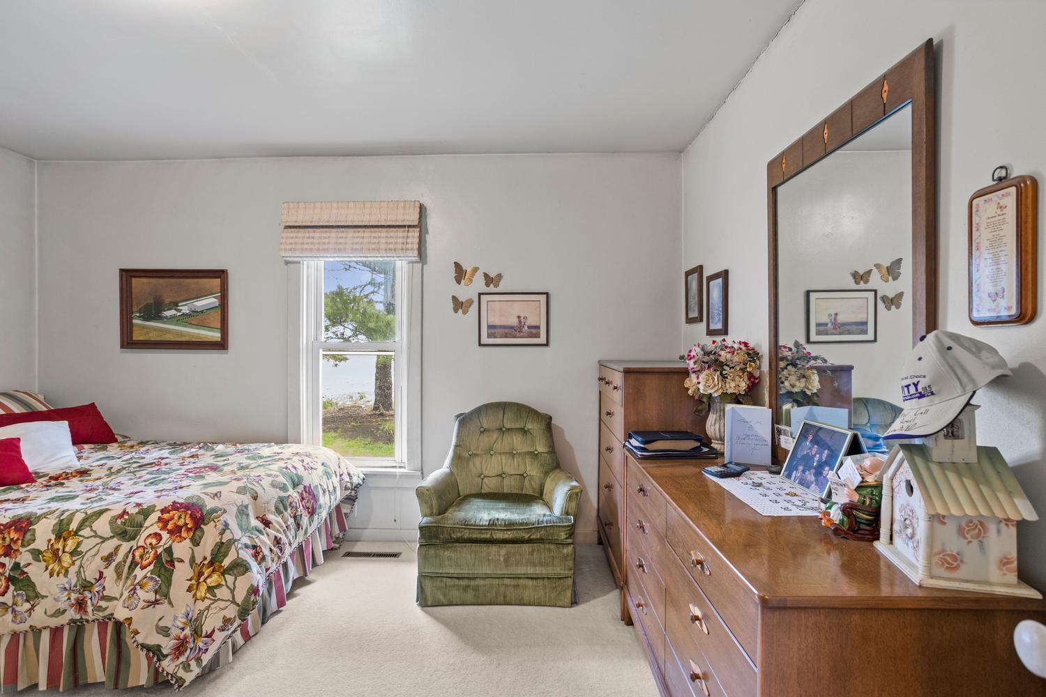 4520 North 600 East Road Sidell, IL 61876 - Photo 23 of 31 a bedroom with bed and window