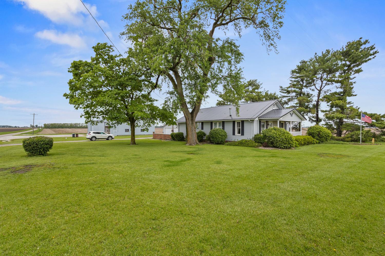 4520 North 600 East Road Sidell, IL 61876 - Photo 3 of 31 a front view of a house with garden