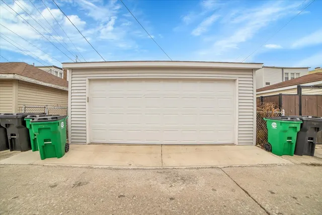 a front view of a house with green space