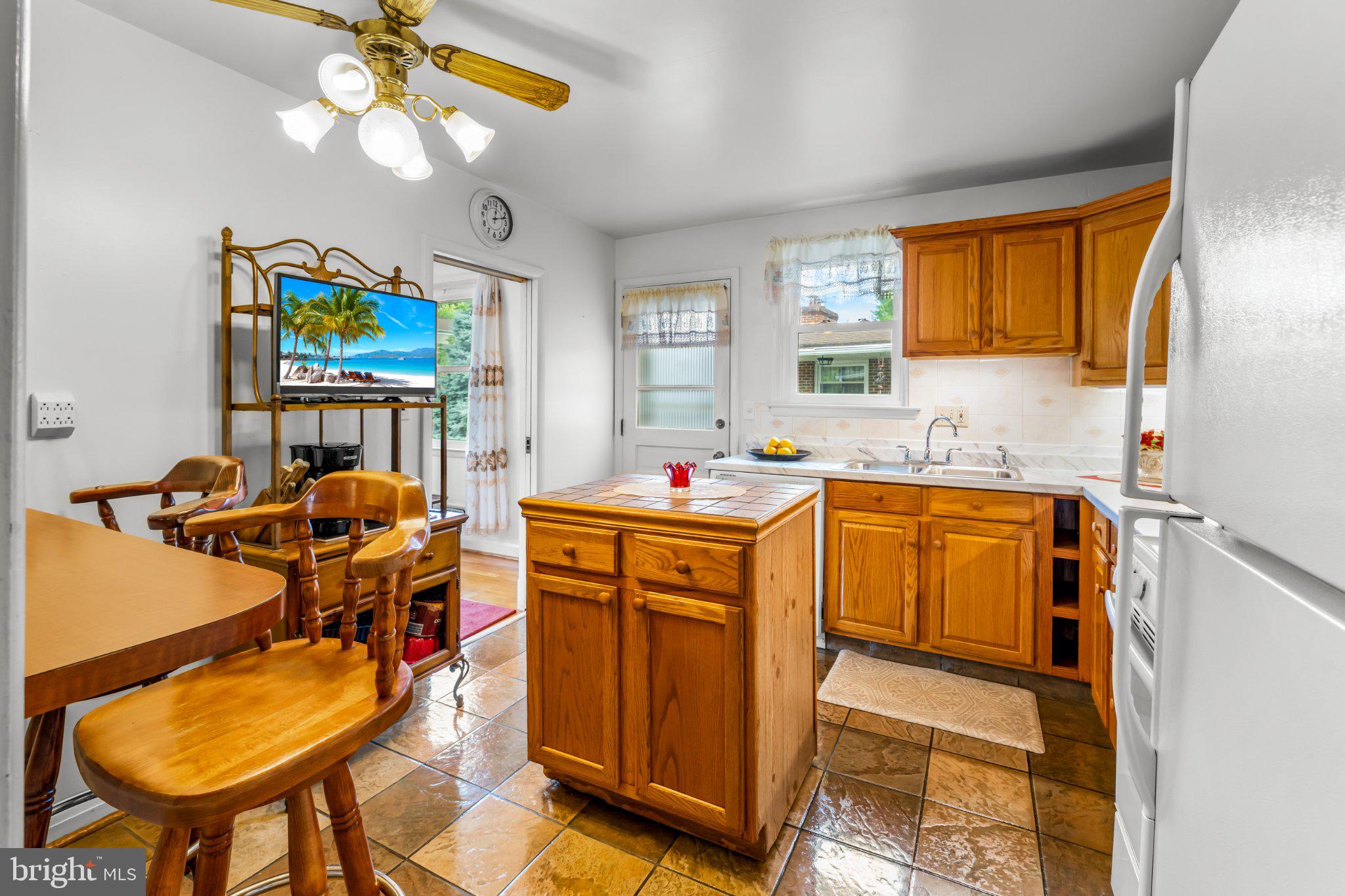 6723 Collinsdale Road Baltimore, MD 21234 - Photo 13 of 43 Bright and inviting kitchen space.