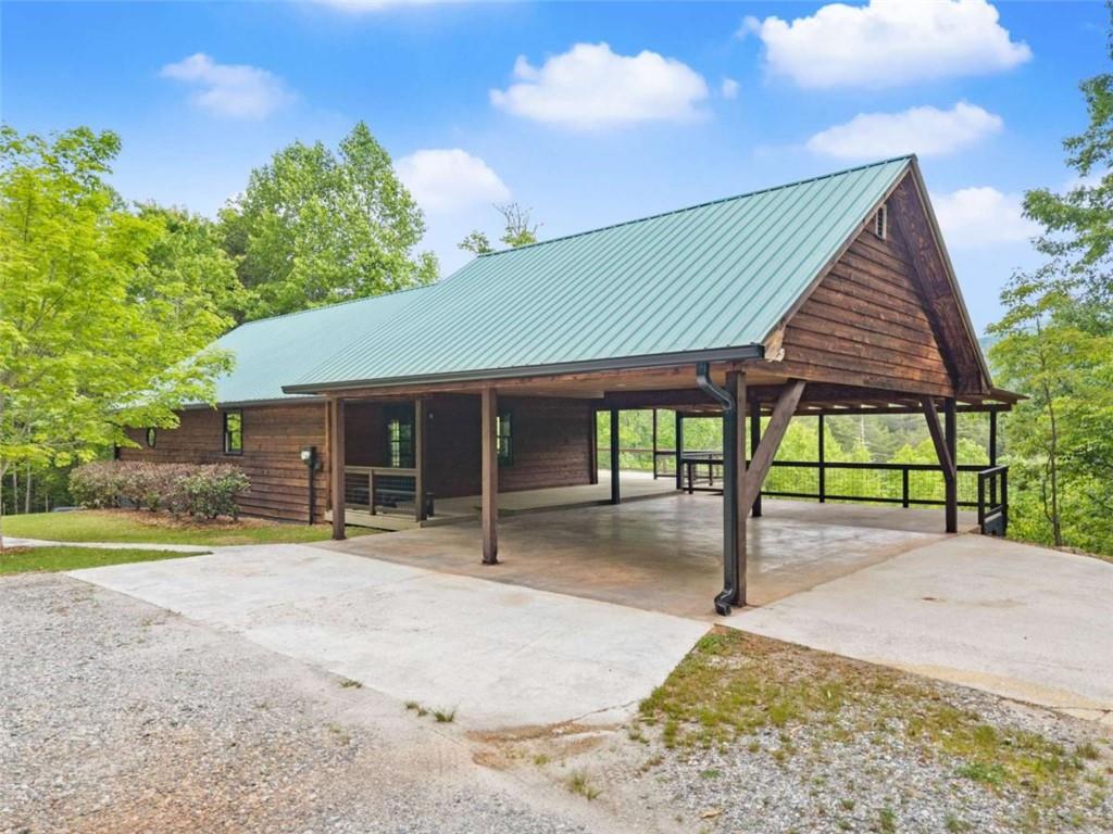 707 South Fern Cove Road Sautee Nacoochee, GA 30571 - Photo 2 of 60 a view of a house with backyard and sitting area