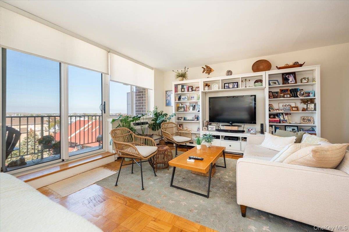 650 Shore Road, Unit 5P Long Beach, NY 11561 - Photo 6 of 29 Living area with wood finished floors