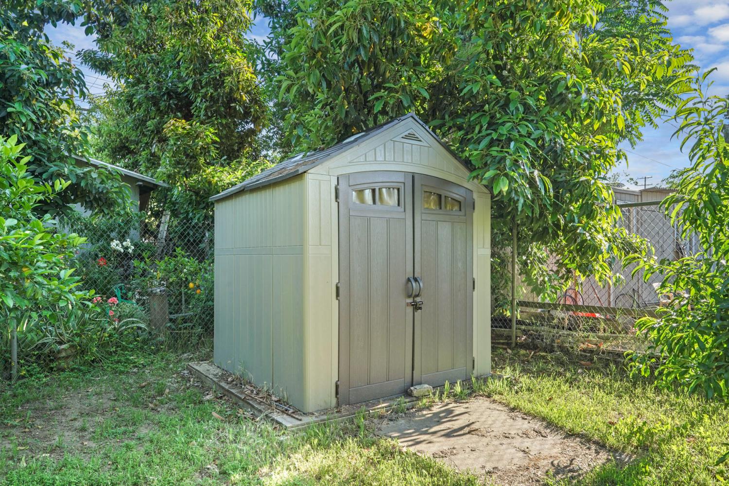 223 Rush Street Lodi, CA 95240 - Photo 19 of 21 a front view of a house with garden