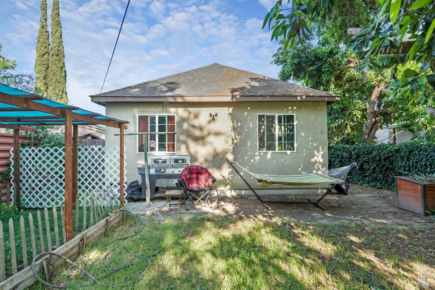 223 Rush Street Lodi, CA 95240 - Photo 21 of 21 a view of a house with backyard and sitting area