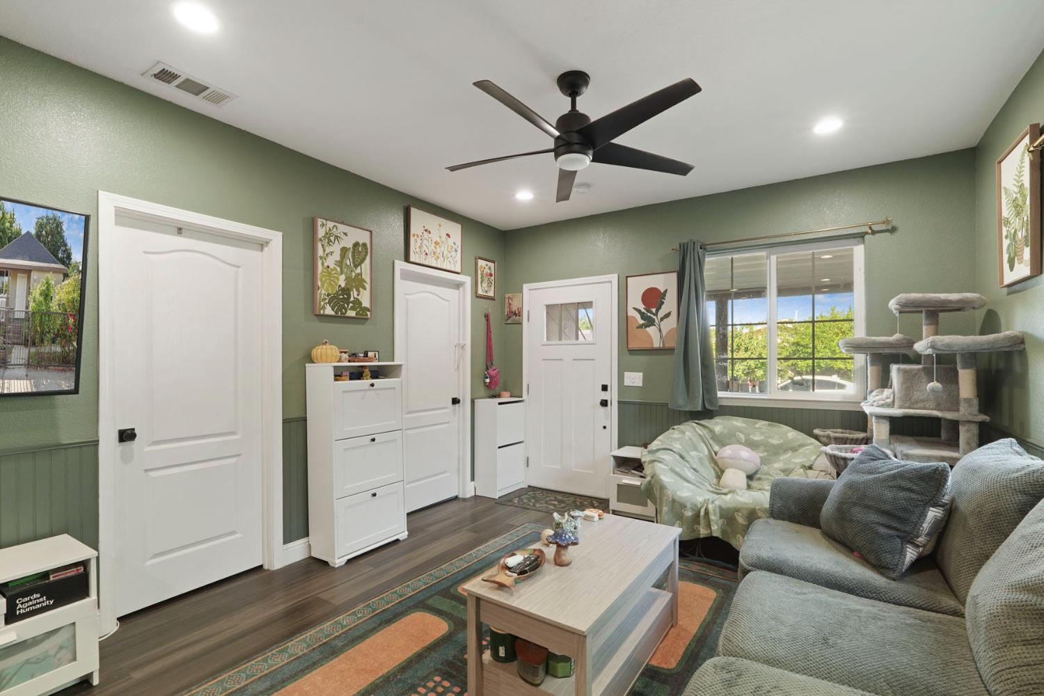 223 Rush Street Lodi, CA 95240 - Photo 6 of 21 a living room with furniture and a window