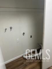 Undisclosed Address Bakersfield, CA 93309 - Photo 11 of 29 a view of small space with racks on the wall