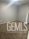 Undisclosed Address Bakersfield, CA 93309 - Photo 14 of 29 a view of wooden floor