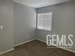 Undisclosed Address Bakersfield, CA 93309 - Photo 17 of 29 a room with a window