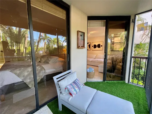 a view of a porch with furniture