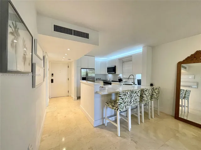 a view of a dining room kitchen and a window