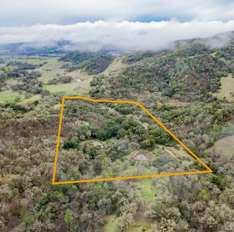a view of balcony with wooden floor