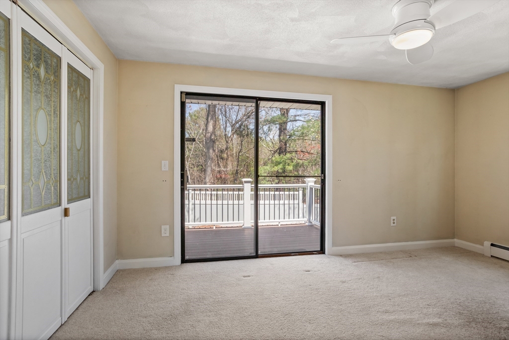 66 Old Stow Road Concord, MA 01742 - Photo 19 of 42 en empty room with windows