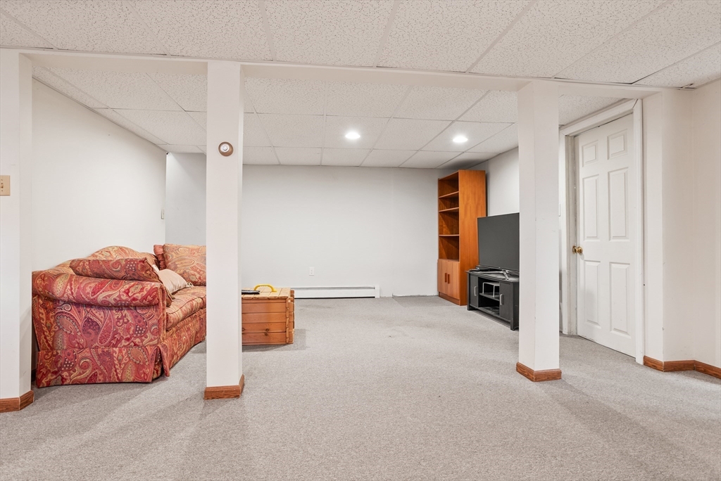66 Old Stow Road Concord, MA 01742 - Photo 31 of 42 a view of a livingroom with furniture