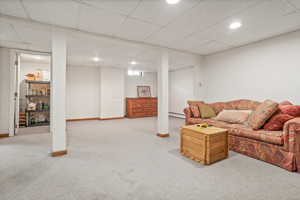 66 Old Stow Road Concord, MA 01742 - Photo 32 of 42 a living room with furniture